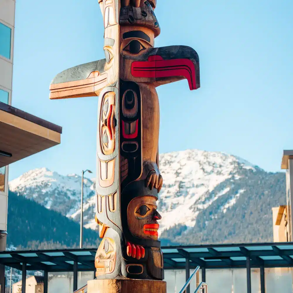 Totem Pole in front of the mountains